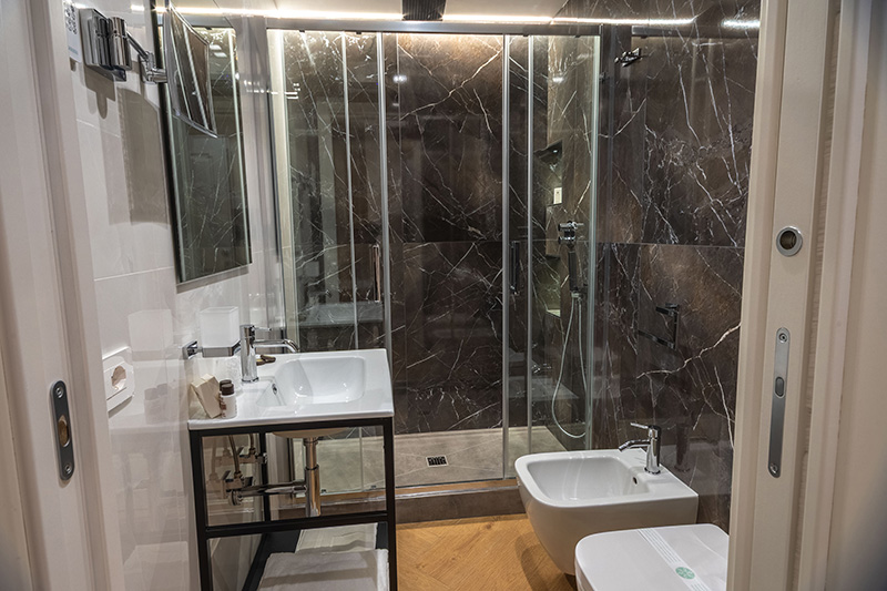 Flat-UrbanSuites camera con bagno privato Flat-UrbanSuites camera con bagno privato